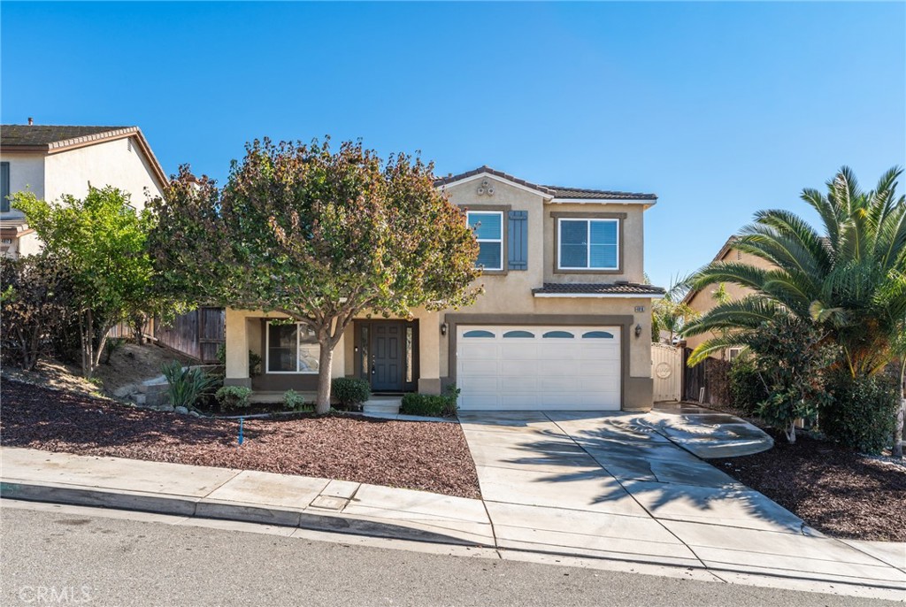 4816 Gregory Road Riverside, CA 92501 - Photo 2 of 55 a front view of a house with a yard