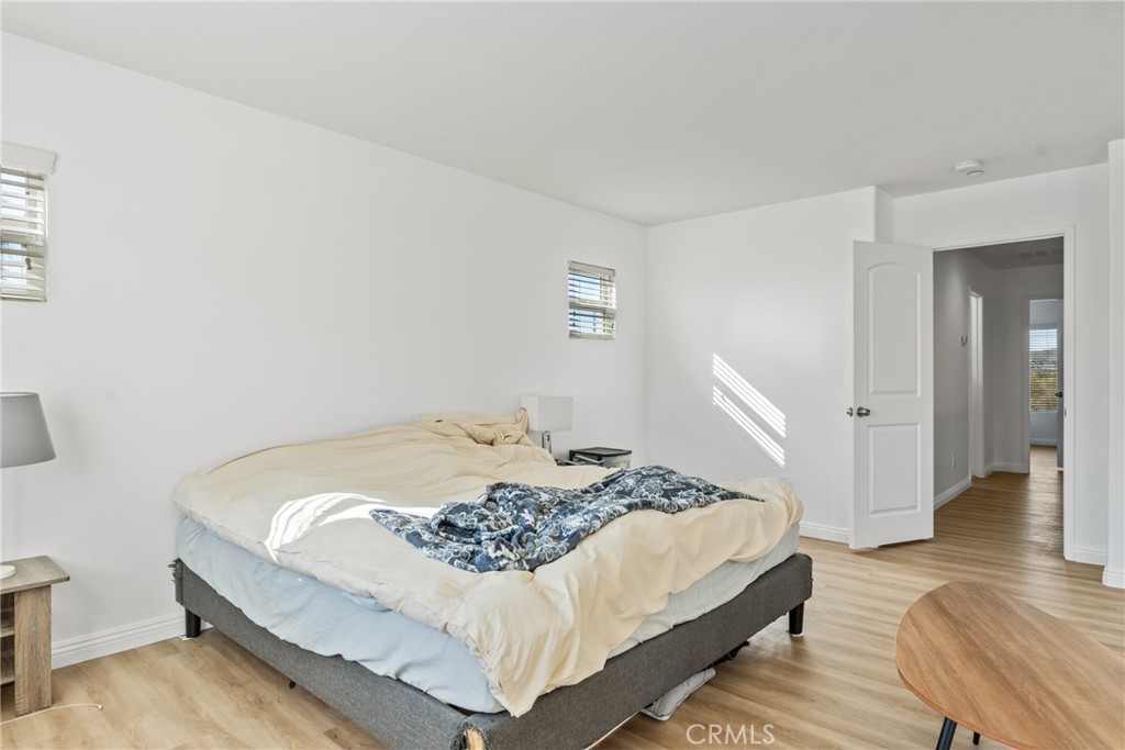 4816 Gregory Road Riverside, CA 92501 - Photo 36 of 55 a bedroom with a bed and a table