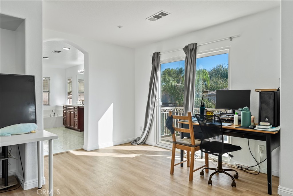 4816 Gregory Road Riverside, CA 92501 - Photo 37 of 55 a view of a livingroom with furniture and a flat screen tv