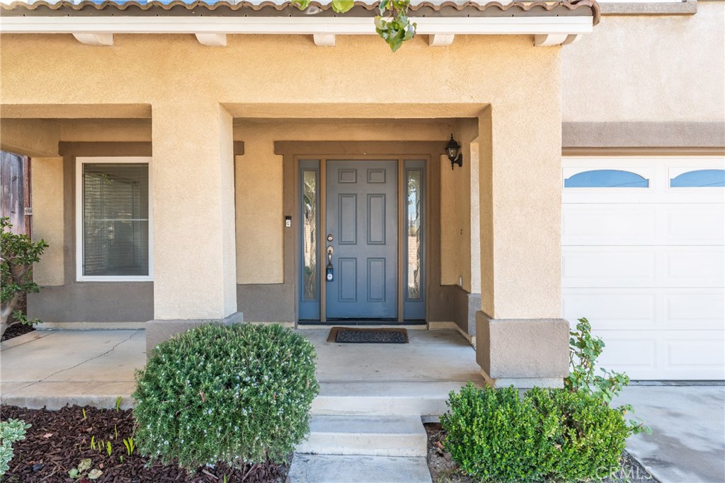 4816 Gregory Road Riverside, CA 92501 - Photo 4 of 55 a front view of a house with a yard