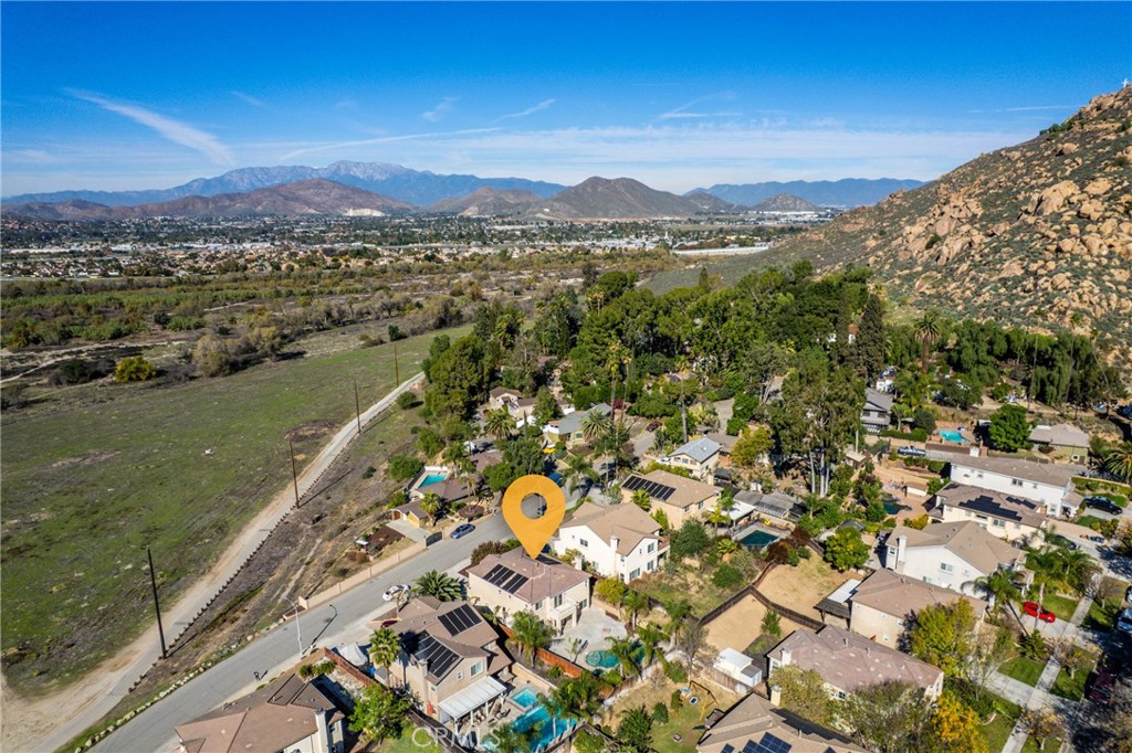 4816 Gregory Road Riverside, CA 92501 - Photo 50 of 55 a view of a city with mountains in the background