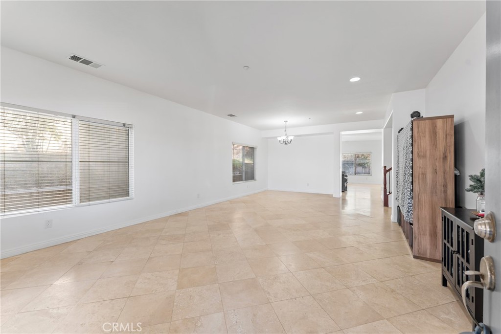 4816 Gregory Road Riverside, CA 92501 - Photo 5 of 55 a view of a livingroom with a staircase