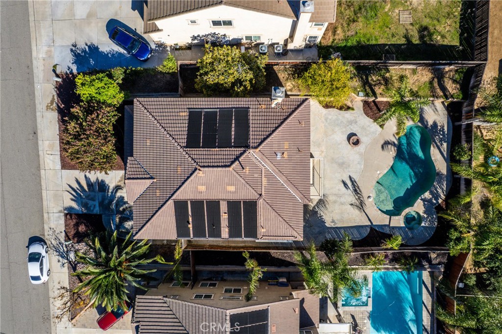 4816 Gregory Road Riverside, CA 92501 - Photo 54 of 55 an aerial view of a house with a yard and potted plants