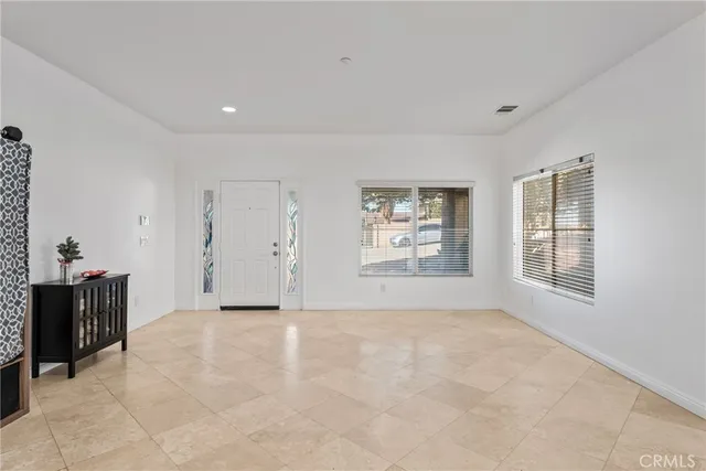 a view of kitchen and kitchen with furniture
