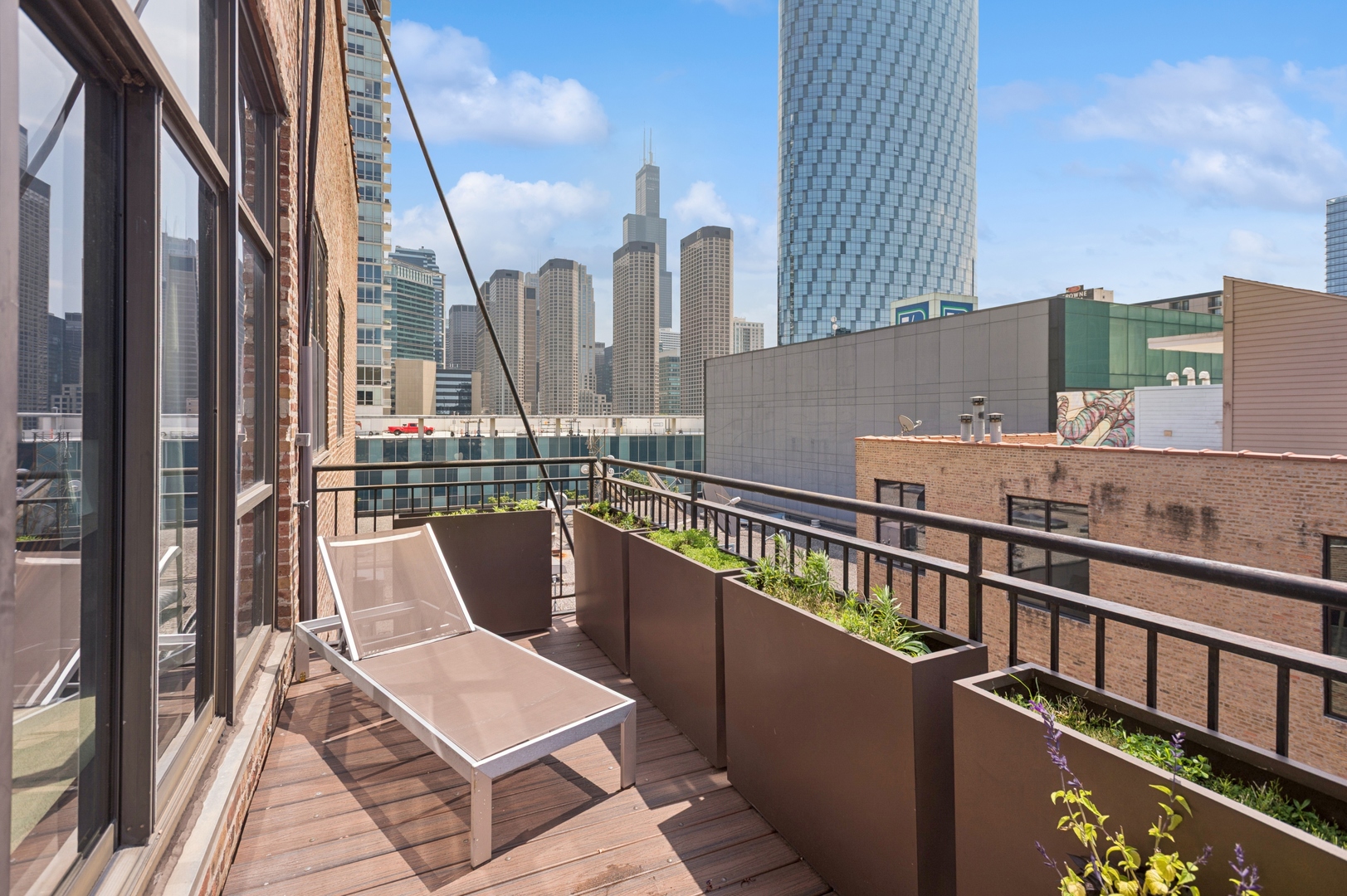 23 North Green Street, Unit 504 Chicago, IL 60607 - Photo 17 of 30 a view of balcony with furniture