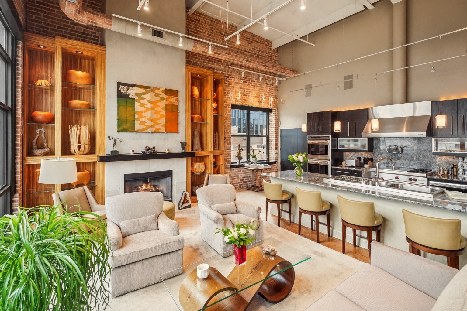 23 North Green Street, Unit 504 Chicago, IL 60607 - Photo 5 of 30 a living room with furniture and a fireplace