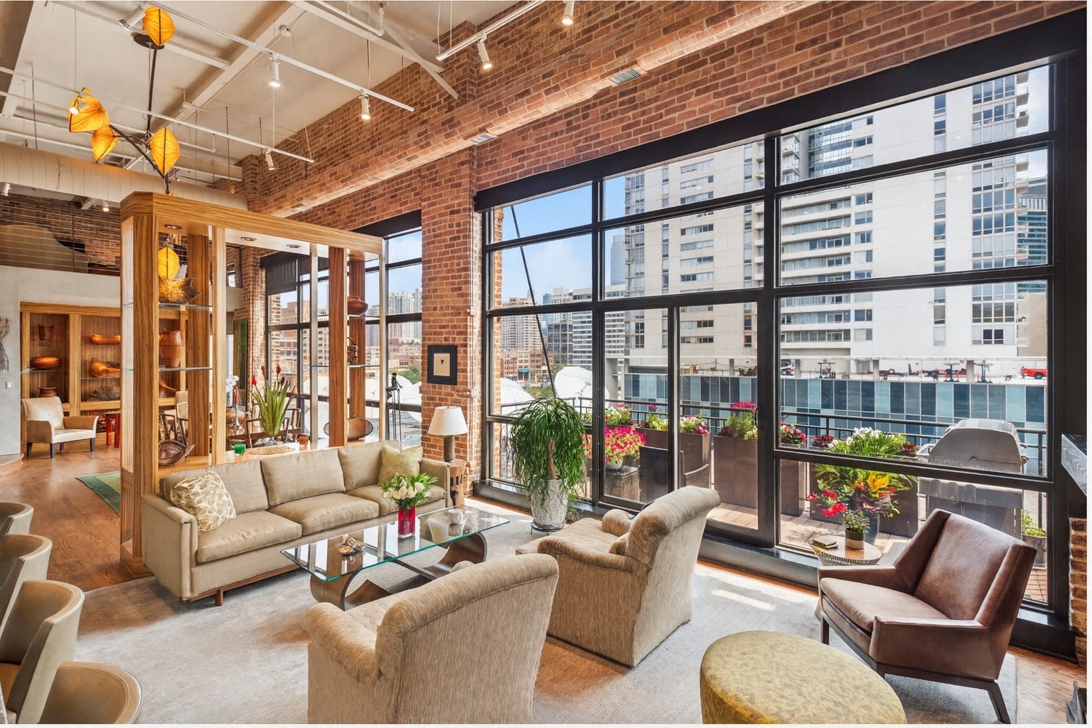 23 North Green Street, Unit 504 Chicago, IL 60607 - Photo 6 of 30 a living room with furniture and a floor to ceiling window