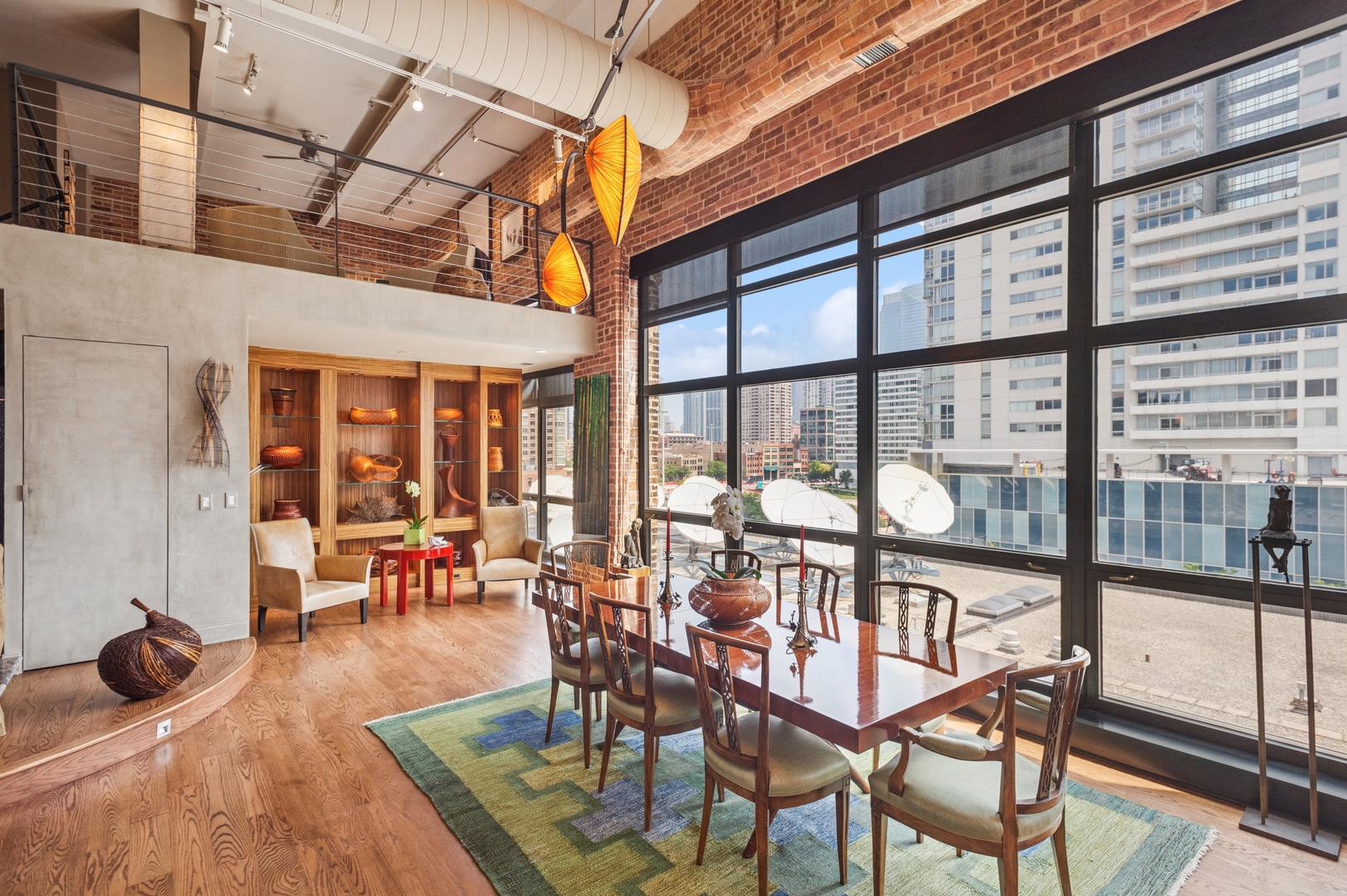 23 North Green Street, Unit 504 Chicago, IL 60607 - Photo 10 of 30 a view of a dining room with furniture water view and large windows