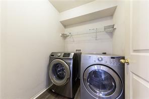 805 Chiselpoint Cove Round Rock, TX 78681 - Photo 21 of 38 Laundry room with washer and dryer and baseboards