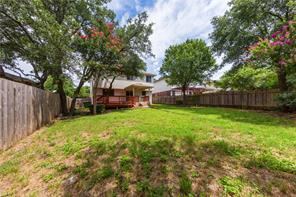 805 Chiselpoint Cove Round Rock, TX 78681 - Photo 36 of 38 Fenced backyard with a deck
