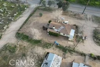 0 Nielson Road Phelan, CA 92371 - Photo 5 of 8 a backyard of a house with a yard and outdoor seating