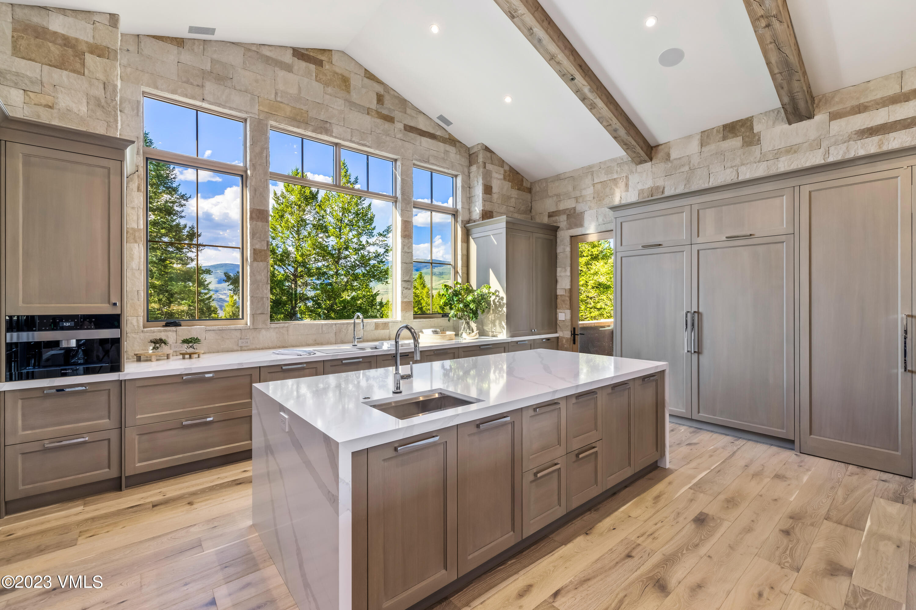 335 Elkhorn Avon, CO 81620 - Photo 13 of 73 a kitchen with a sink and large window