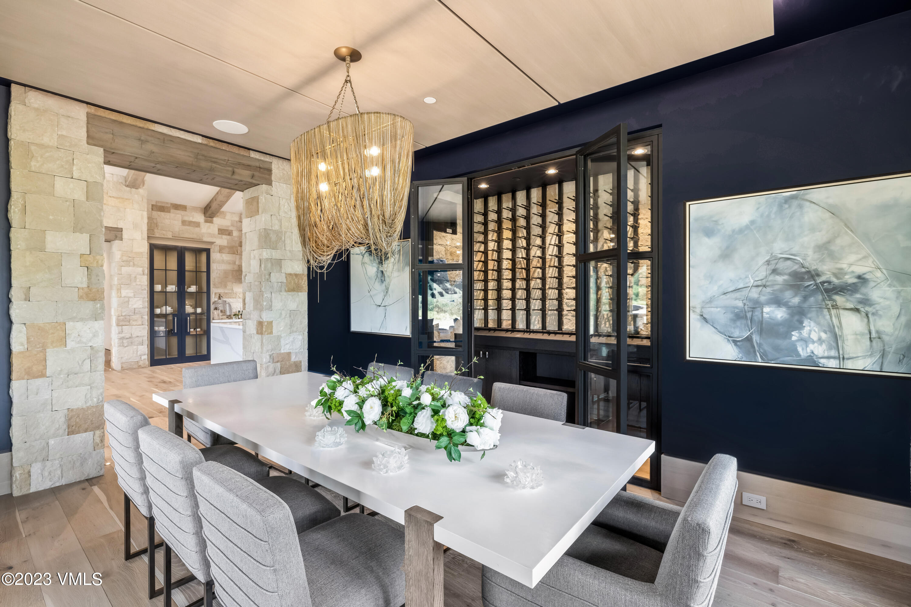 335 Elkhorn Avon, CO 81620 - Photo 18 of 73 a view of a dining room with furniture and a chandelier