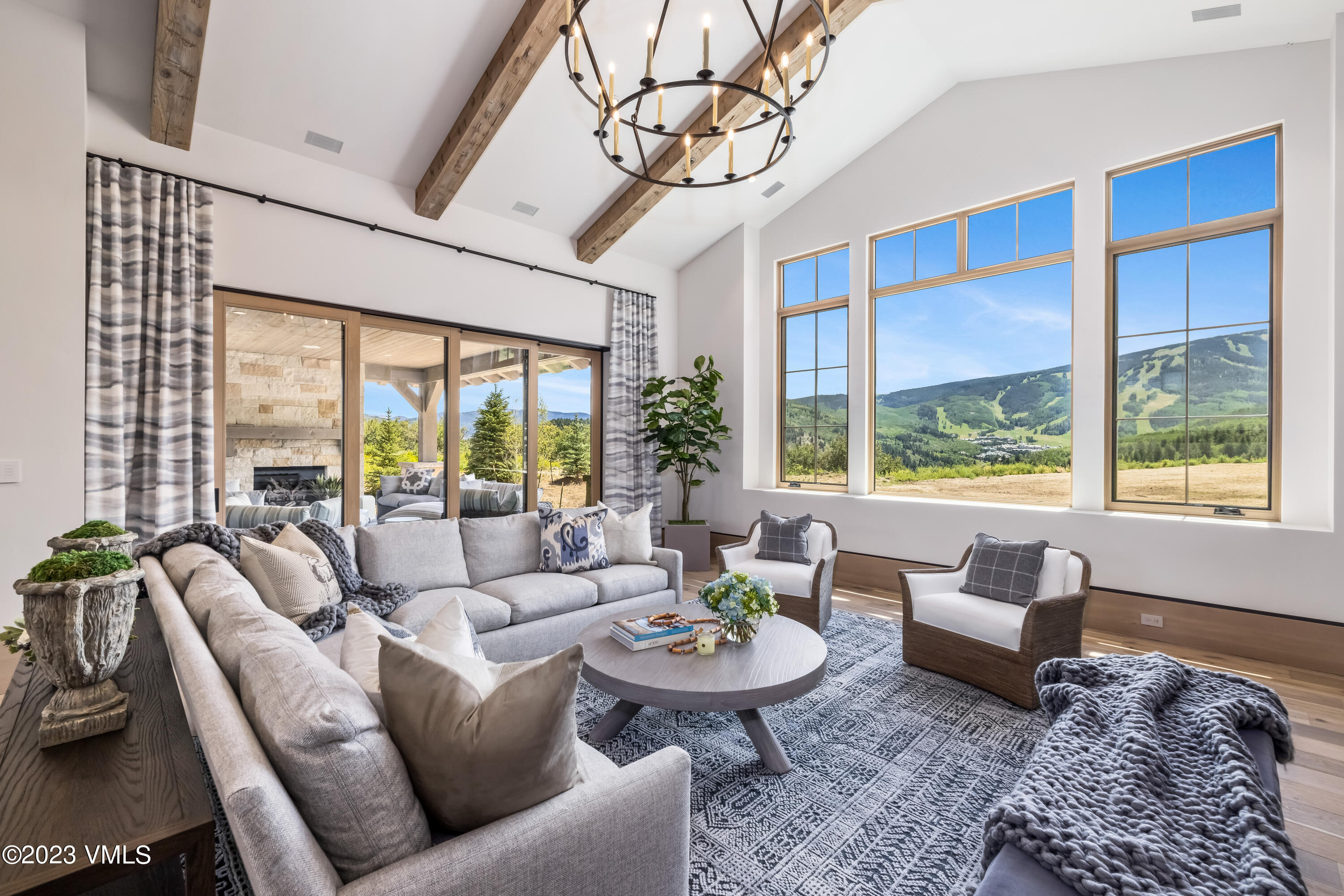 335 Elkhorn Avon, CO 81620 - Photo 20 of 73 a living room with furniture and a large window