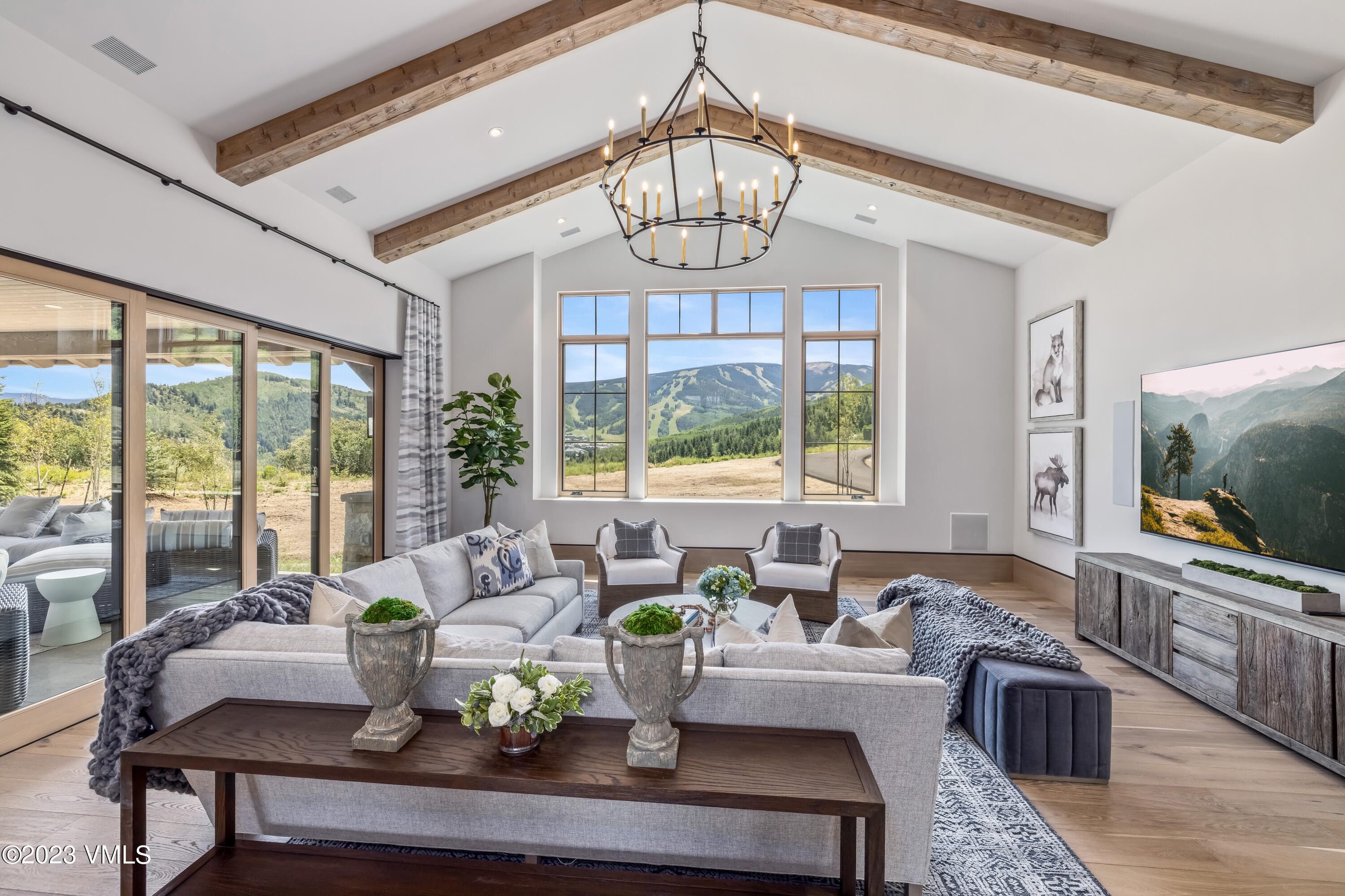 335 Elkhorn Avon, CO 81620 - Photo 21 of 73 a living room with fireplace furniture and a flat screen tv