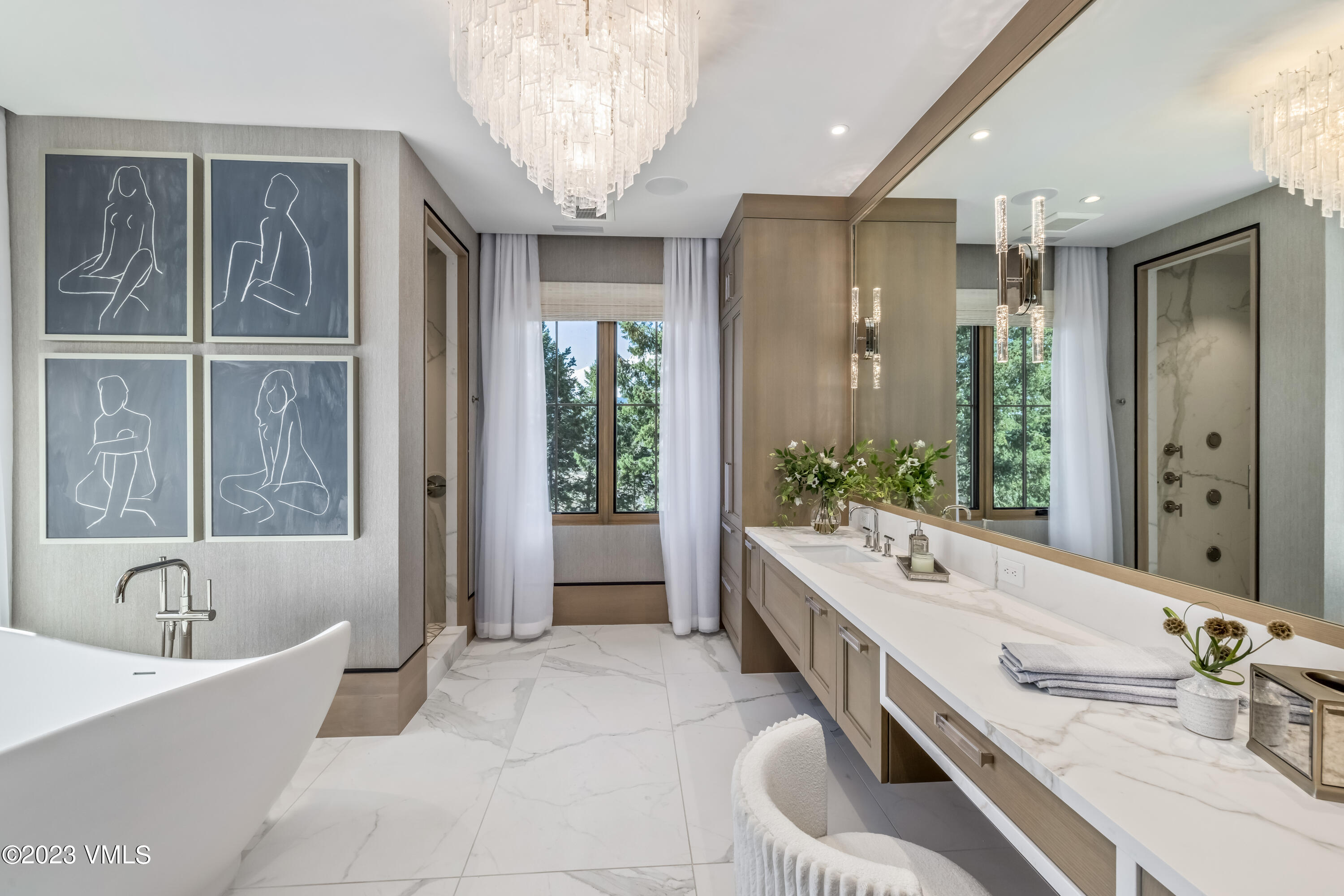 335 Elkhorn Avon, CO 81620 - Photo 29 of 73 a spacious bathroom with a granite countertop tub sink and mirror