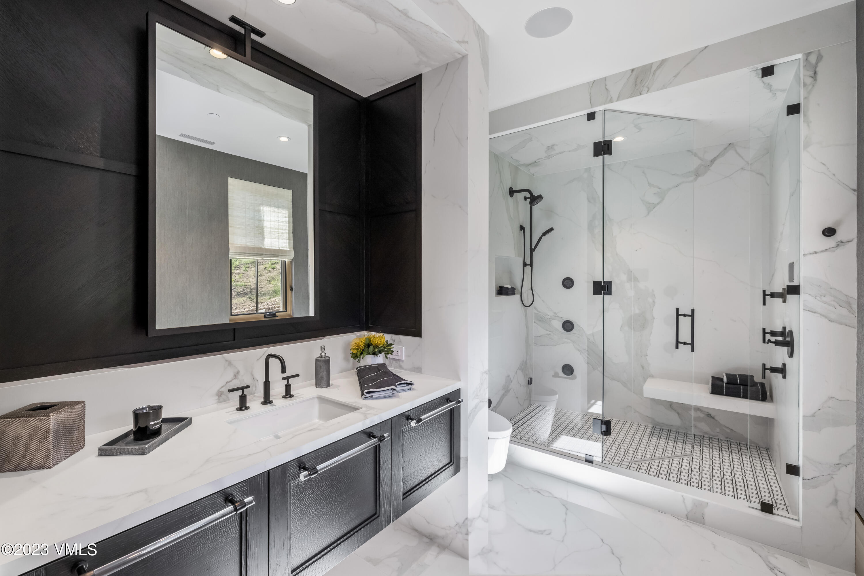 335 Elkhorn Avon, CO 81620 - Photo 30 of 73 a bathroom with a tub sink a mirror and shower