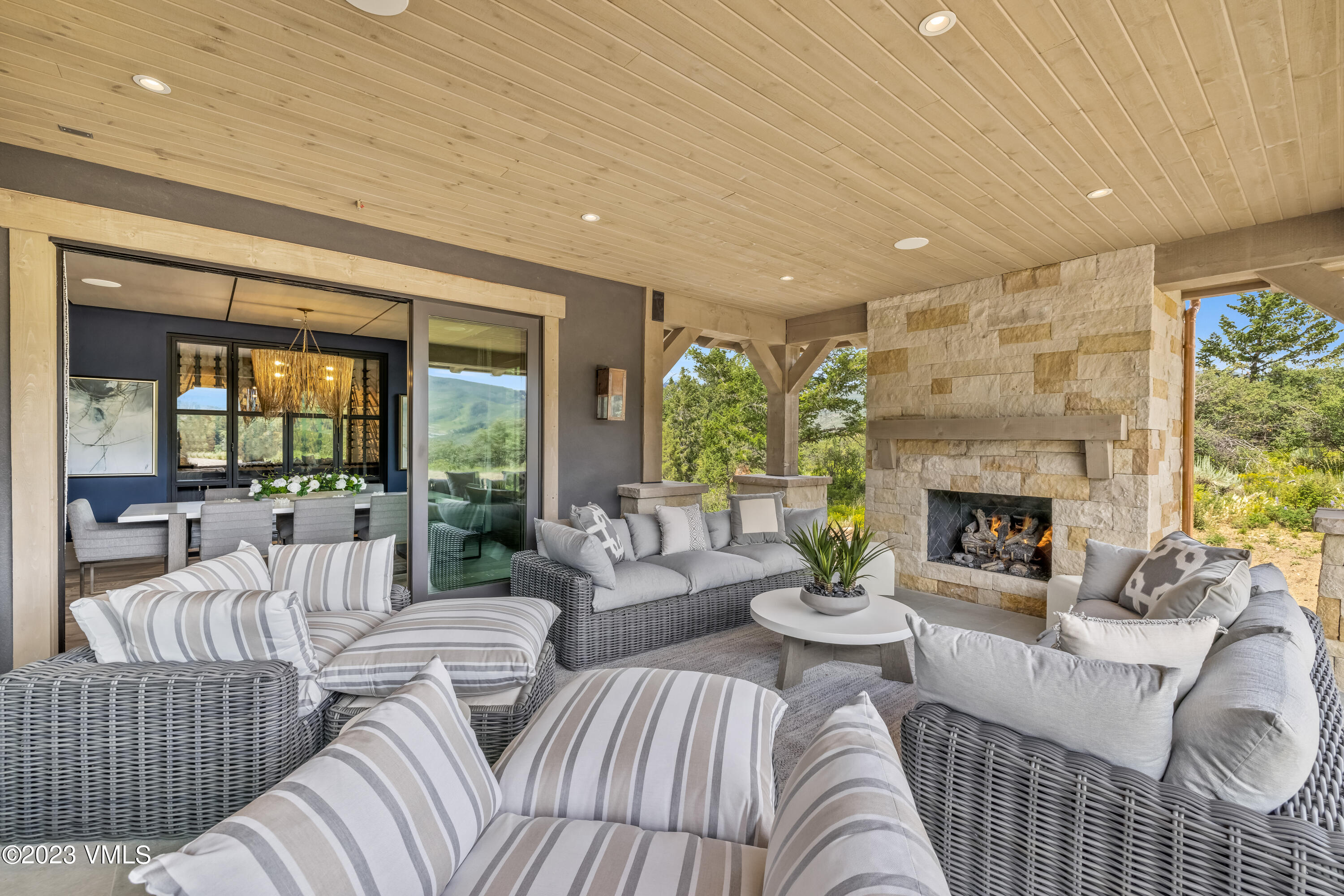 335 Elkhorn Avon, CO 81620 - Photo 32 of 73 a living room with furniture and a fireplace
