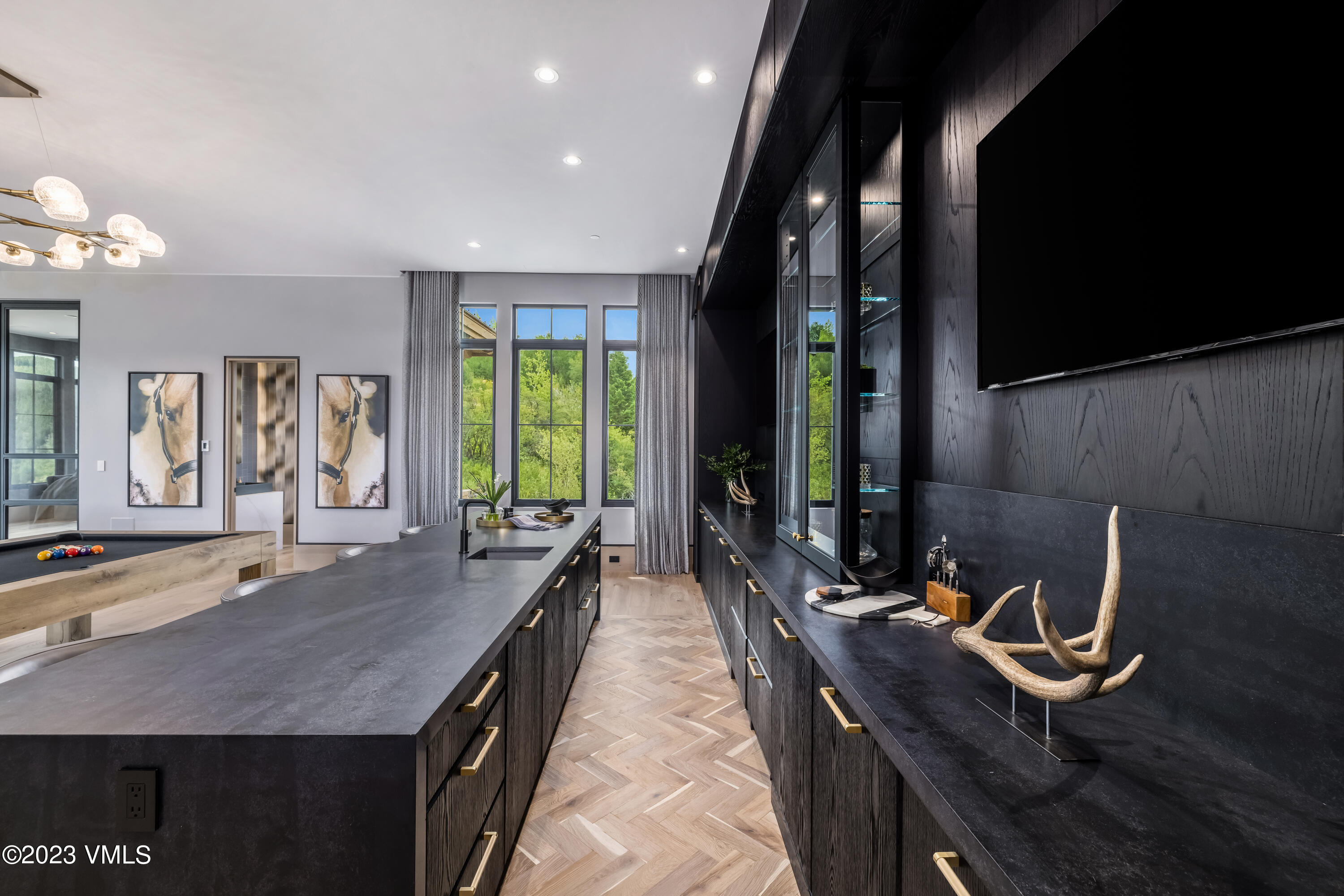 335 Elkhorn Avon, CO 81620 - Photo 42 of 73 a room with gym equipment and large window