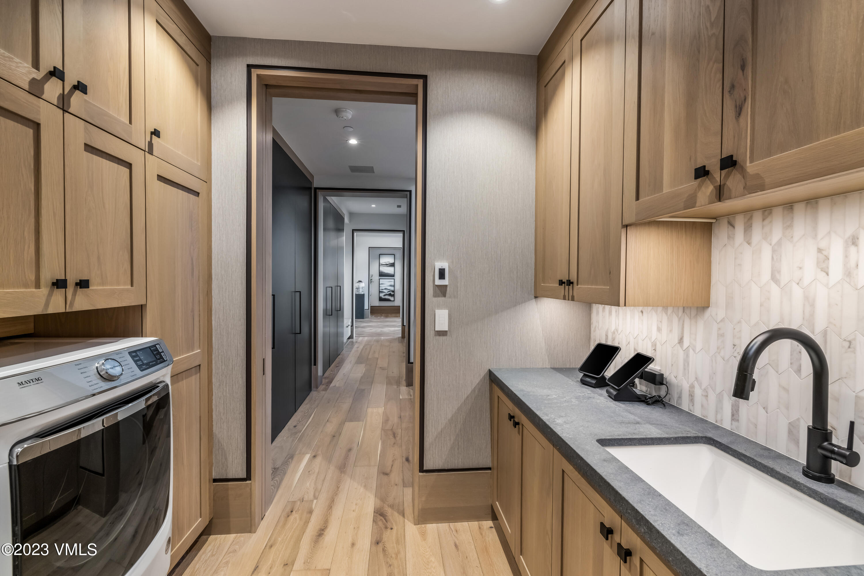 335 Elkhorn Avon, CO 81620 - Photo 43 of 73 a kitchen with granite countertop a sink stainless steel appliances and cabinets