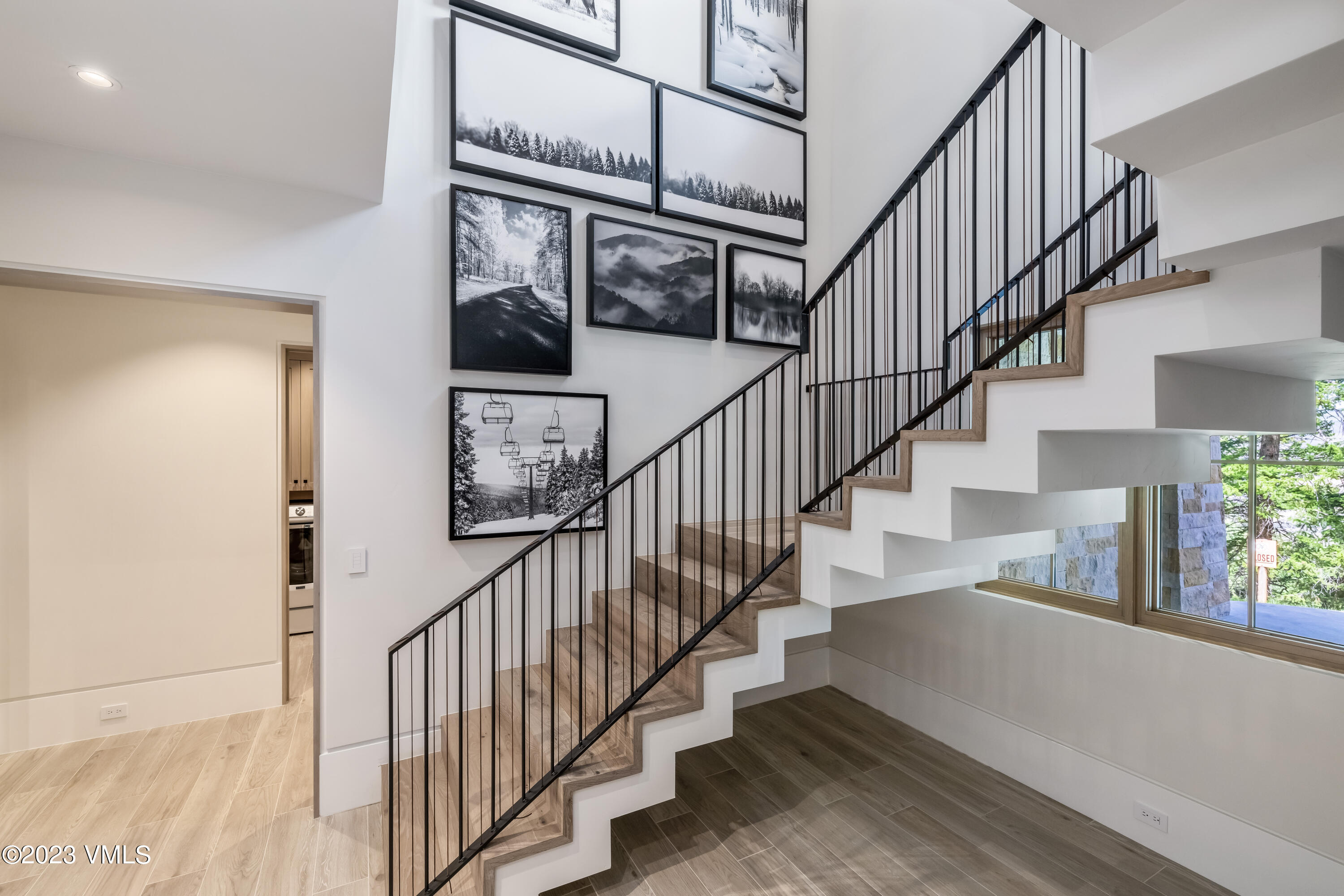 335 Elkhorn Avon, CO 81620 - Photo 45 of 73 a view of entryway and hall with wooden floor