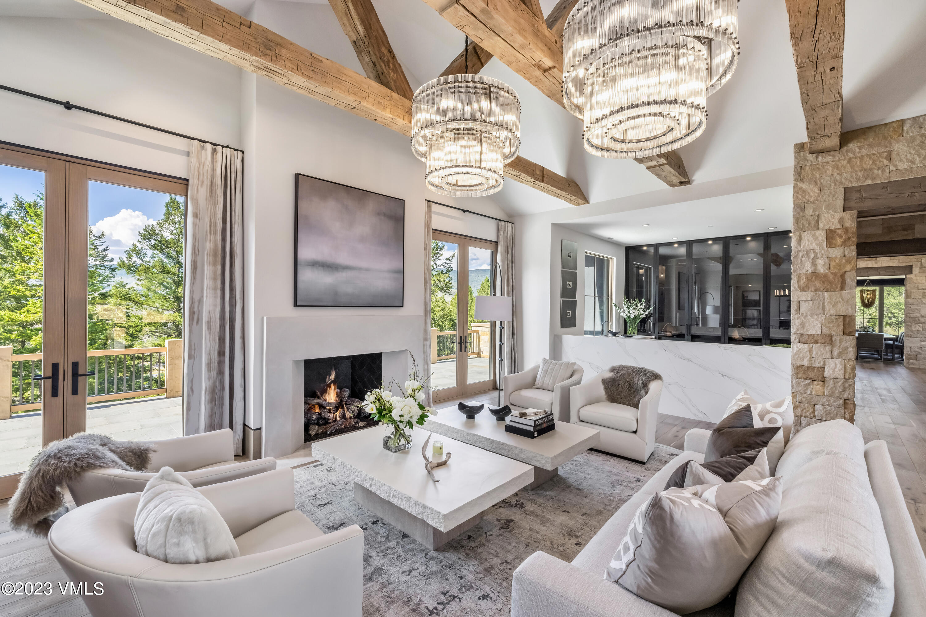 335 Elkhorn Avon, CO 81620 - Photo 5 of 73 a living room with furniture fireplace and a large window