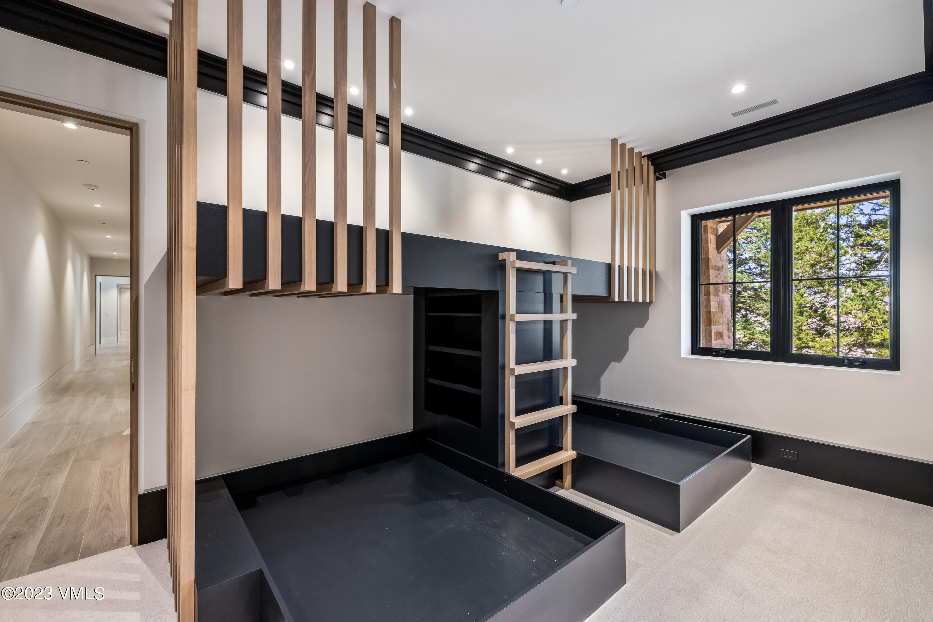 335 Elkhorn Avon, CO 81620 - Photo 52 of 73 a view of walk in closet with clothes and shoes