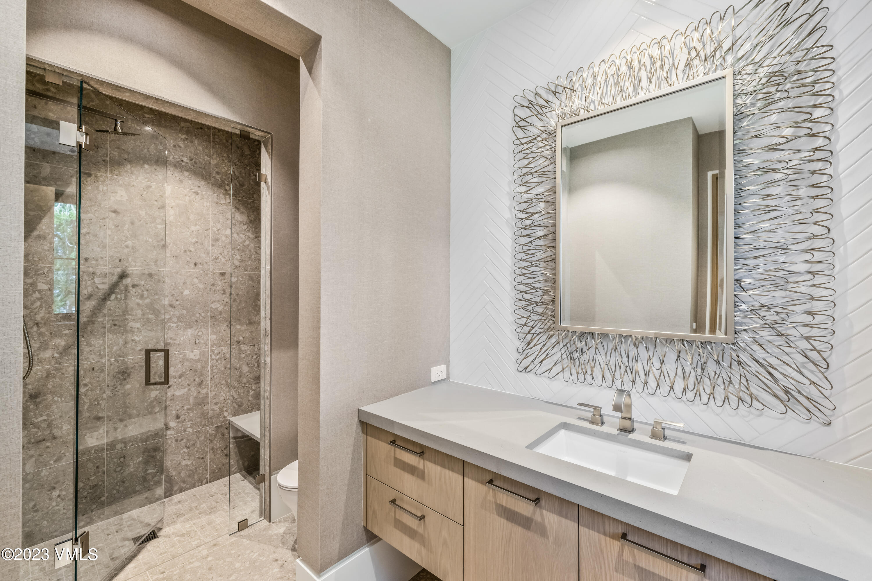 335 Elkhorn Avon, CO 81620 - Photo 61 of 73 a bathroom with a granite countertop sink a mirror and a shower