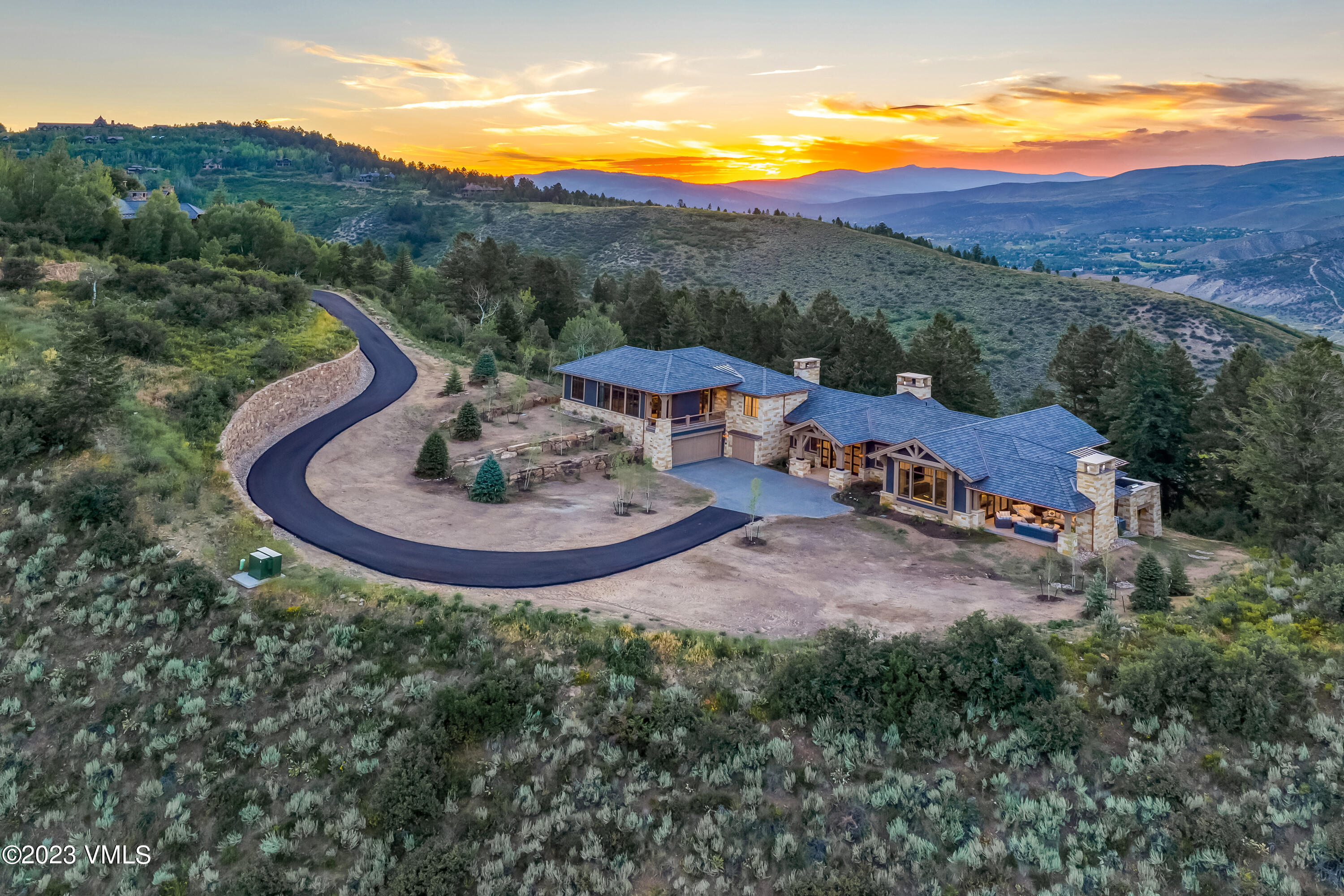 335 Elkhorn Avon, CO 81620 - Photo 70 of 73 a view of a house with a mountain and a forest