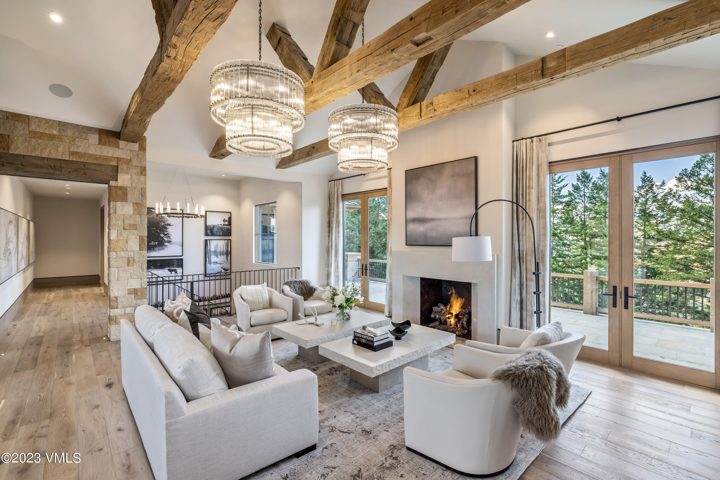 335 Elkhorn Avon, CO 81620 - Photo 7 of 73 a living room with furniture fireplace and a large window