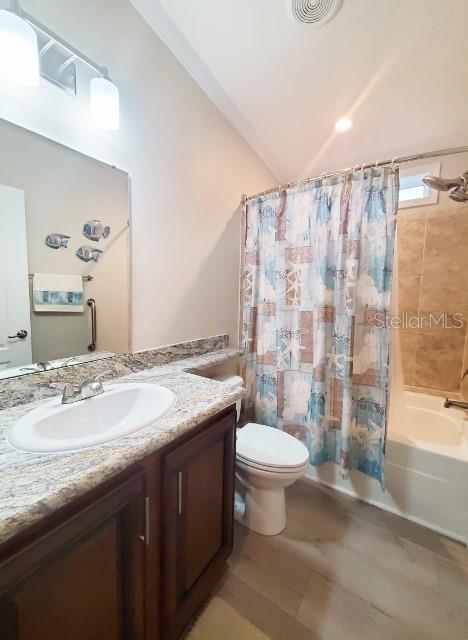 12116 Southwest County 769 Rd Lake, Unit 121 Lake Suzy, FL 34269 - Photo 11 of 45 a bathroom with a granite countertop sink toilet a mirror and shower