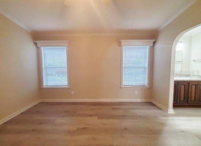 12116 Southwest County 769 Rd Lake, Unit 121 Lake Suzy, FL 34269 - Photo 24 of 45 an empty room with windows