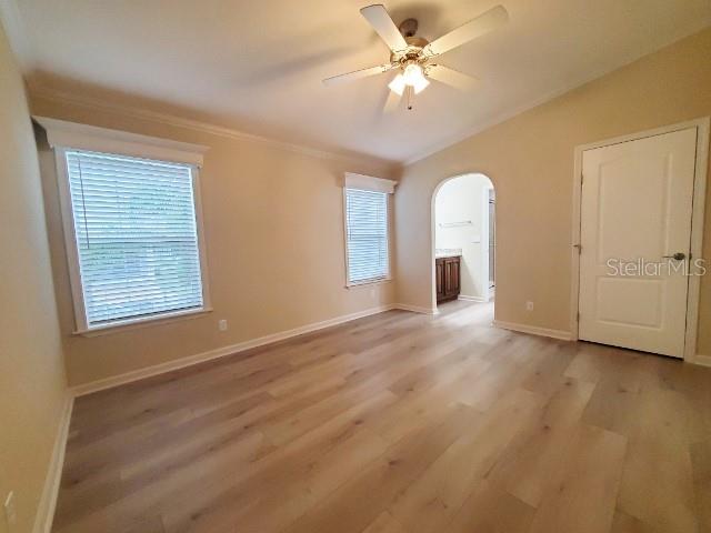 12116 Southwest County 769 Rd Lake, Unit 121 Lake Suzy, FL 34269 - Photo 25 of 45 a view of an empty room with a window