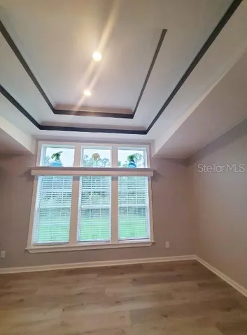 a kitchen with stainless steel appliances granite countertop sink stove and cabinets