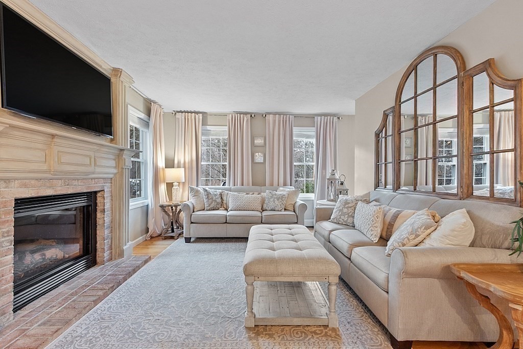41 Willard Road Ashburnham, MA 01430 - Photo 12 of 42 a living room with furniture fireplace and flat screen tv
