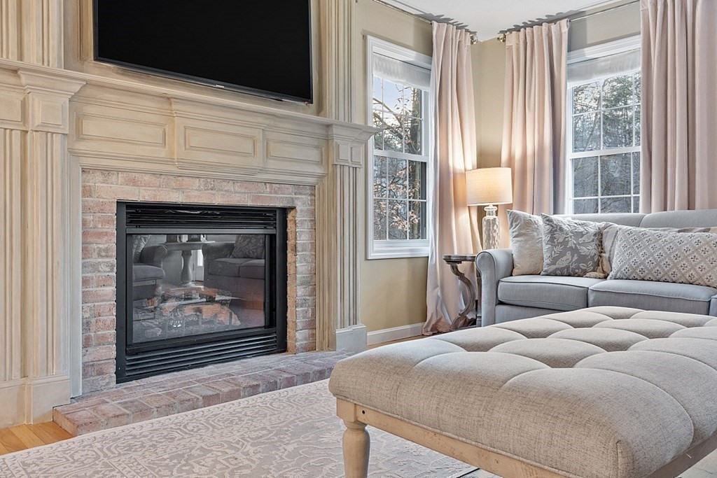 41 Willard Road Ashburnham, MA 01430 - Photo 14 of 42 a bedroom with a bed and a fireplace