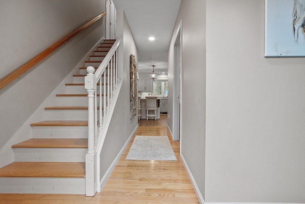 41 Willard Road Ashburnham, MA 01430 - Photo 17 of 42 a view of a hallway with wooden floor and staircase