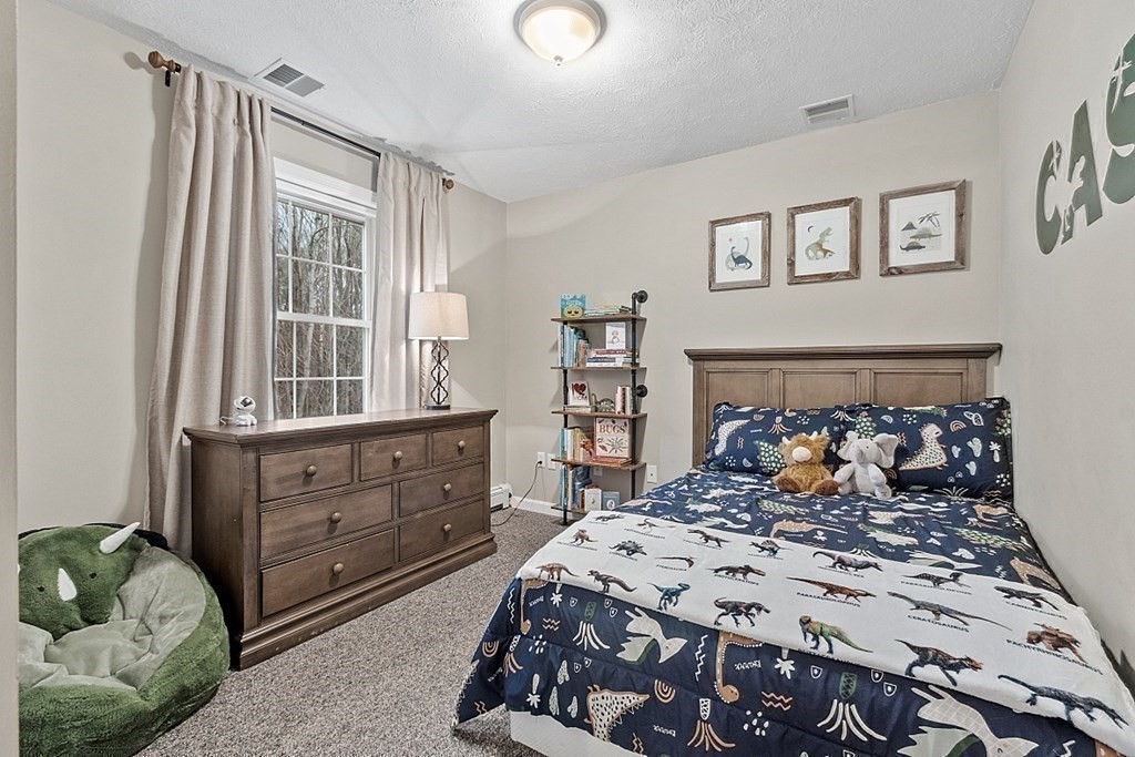 41 Willard Road Ashburnham, MA 01430 - Photo 23 of 42 a bedroom with a bed and window