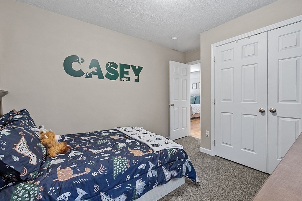 41 Willard Road Ashburnham, MA 01430 - Photo 24 of 42 a bedroom with a bed and a window