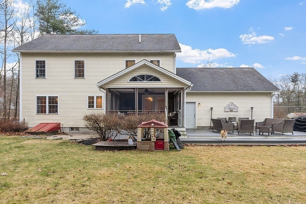 41 Willard Road Ashburnham, MA 01430 - Photo 39 of 42 a front view of house with yard outdoor seating and barbeque oven