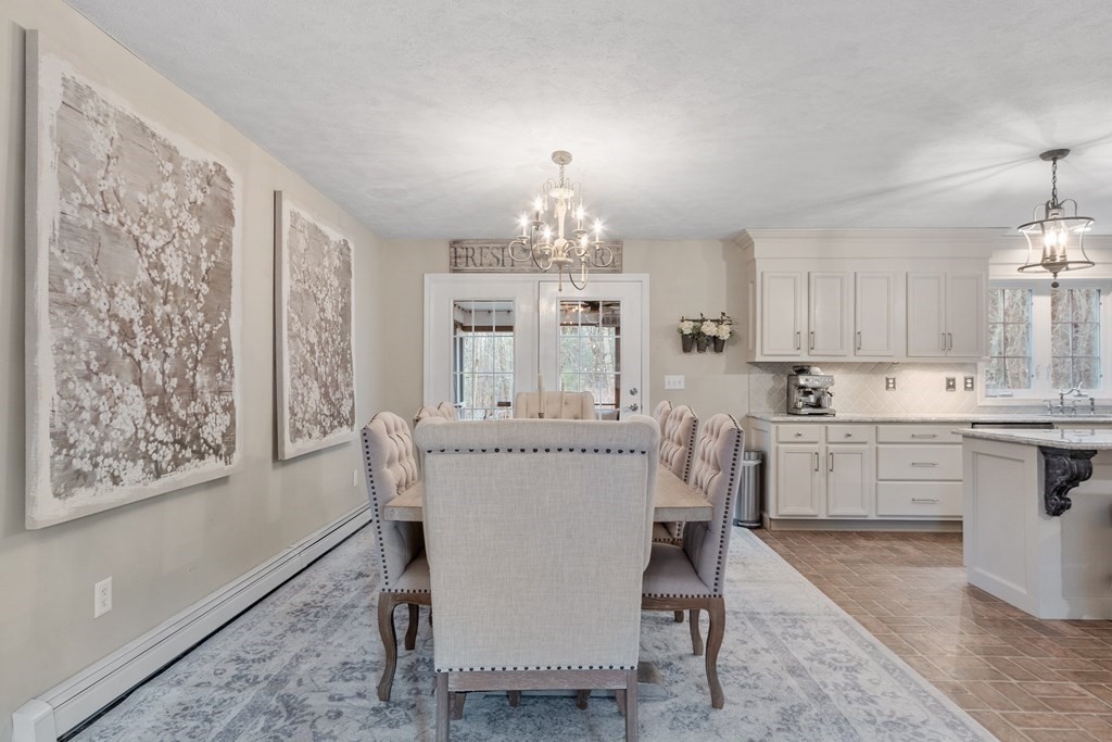 41 Willard Road Ashburnham, MA 01430 - Photo 9 of 42 a view of a dining room with furniture window and wooden floor