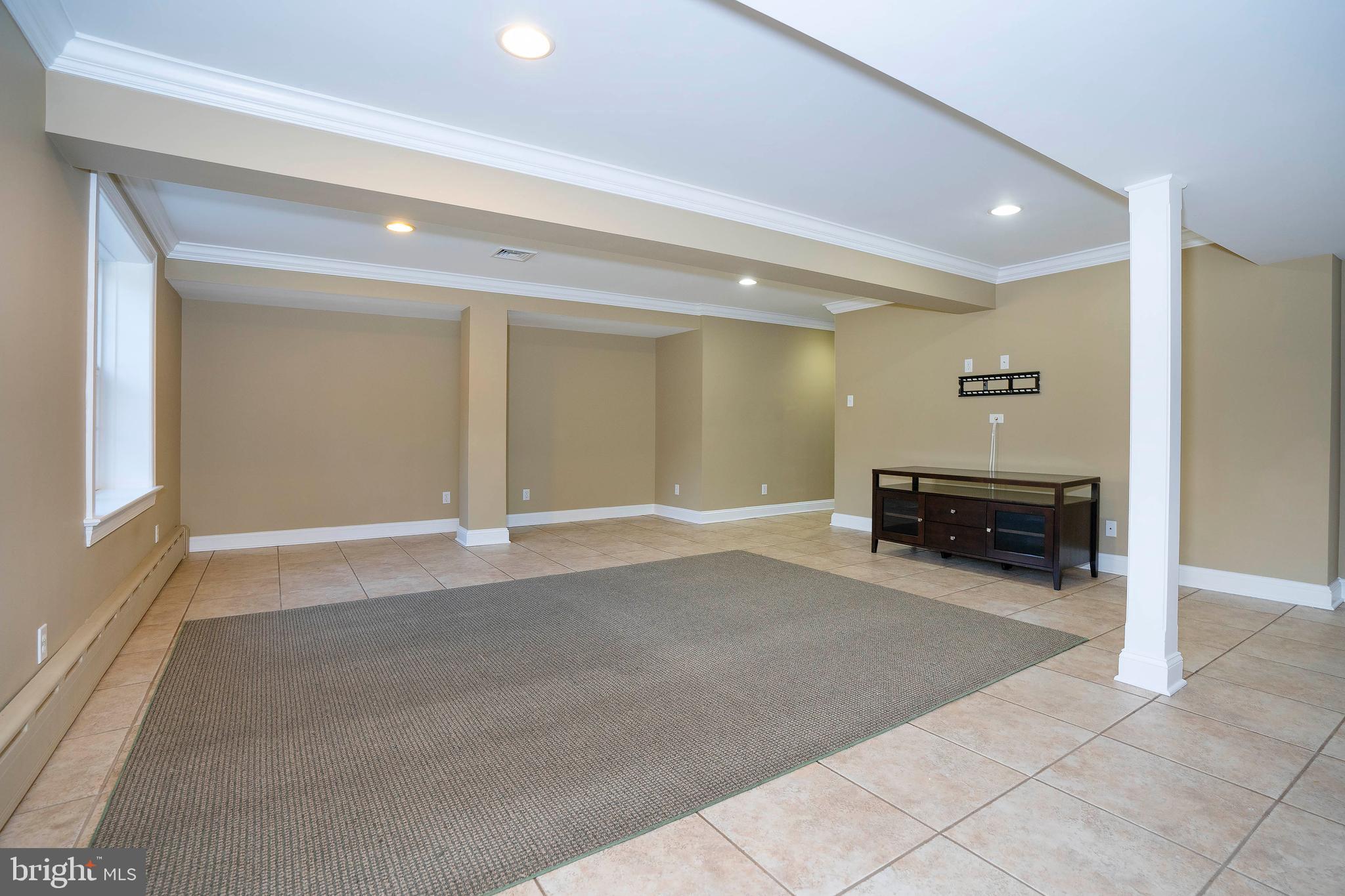 358 Ring Road Chadds Ford, PA 19317 - Photo 45 of 78 Finished basement with tile floor
