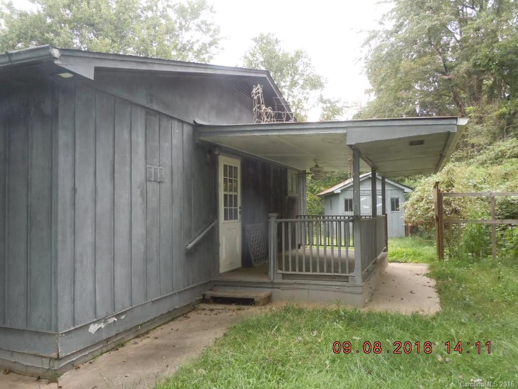 61 Stroupe Road Canton, NC 28716 - Photo 2 of 10 a view of a house with a yard