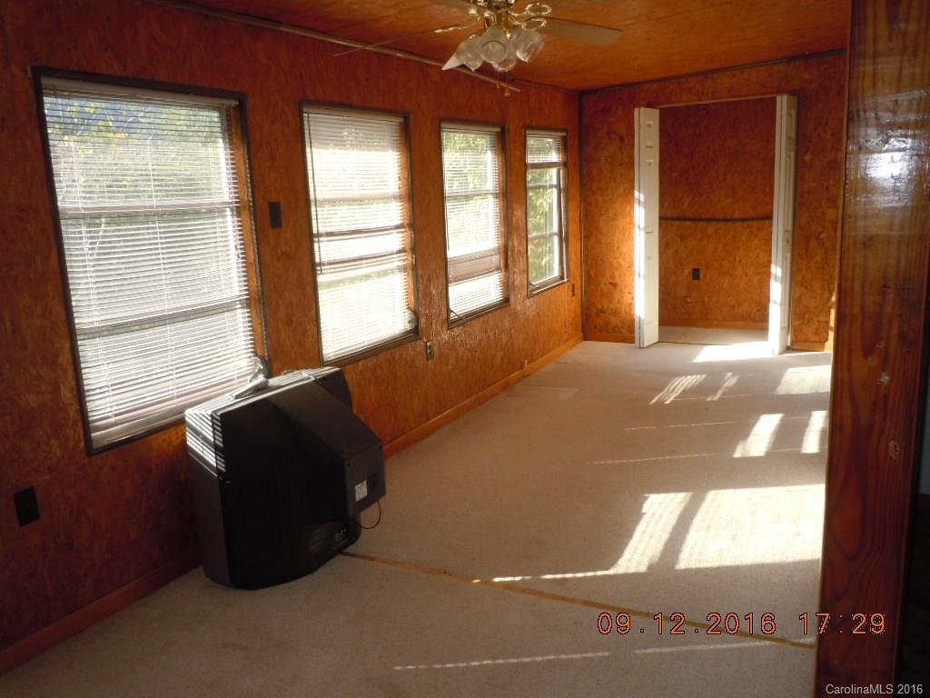61 Stroupe Road Canton, NC 28716 - Photo 10 of 10 a living room with a large window