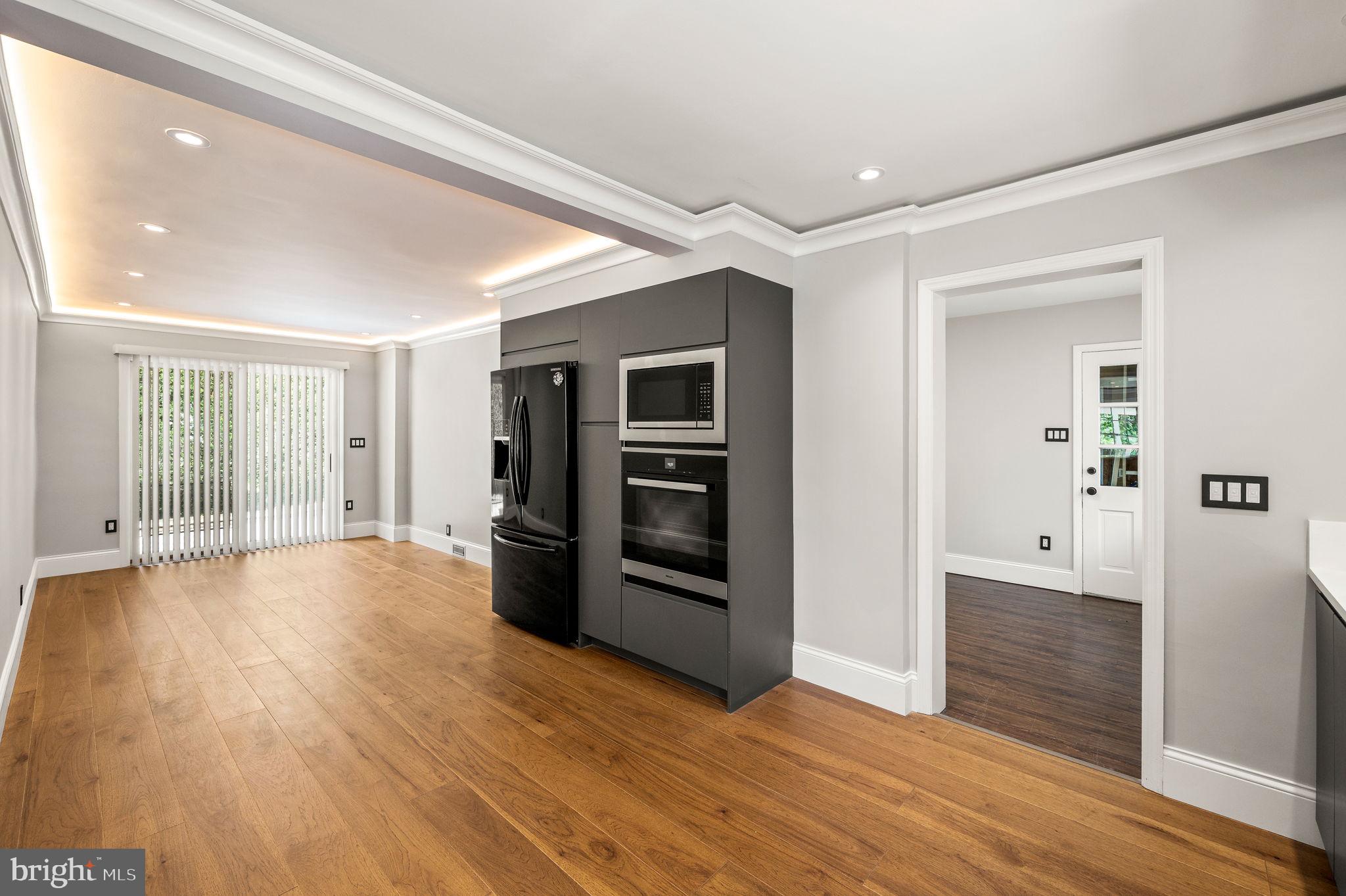 547 West Beechtree Lane Wayne, PA 19087 - Photo 14 of 51 wooden floor in an empty room with a window
