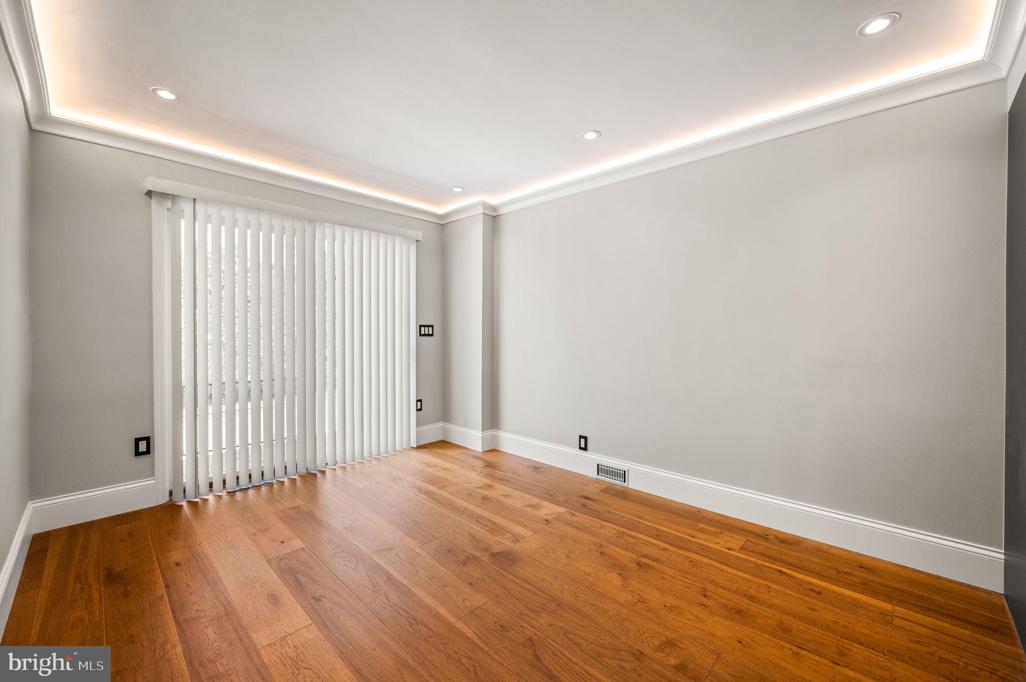 547 West Beechtree Lane Wayne, PA 19087 - Photo 17 of 51 a view of an empty room with wooden floor