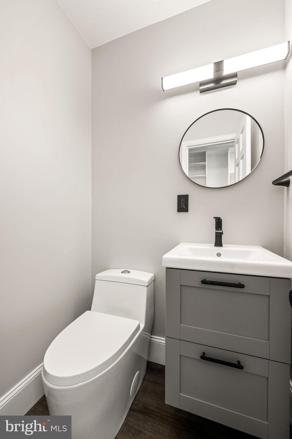 547 West Beechtree Lane Wayne, PA 19087 - Photo 18 of 51 a bathroom with a sink mirror vanity and toilet