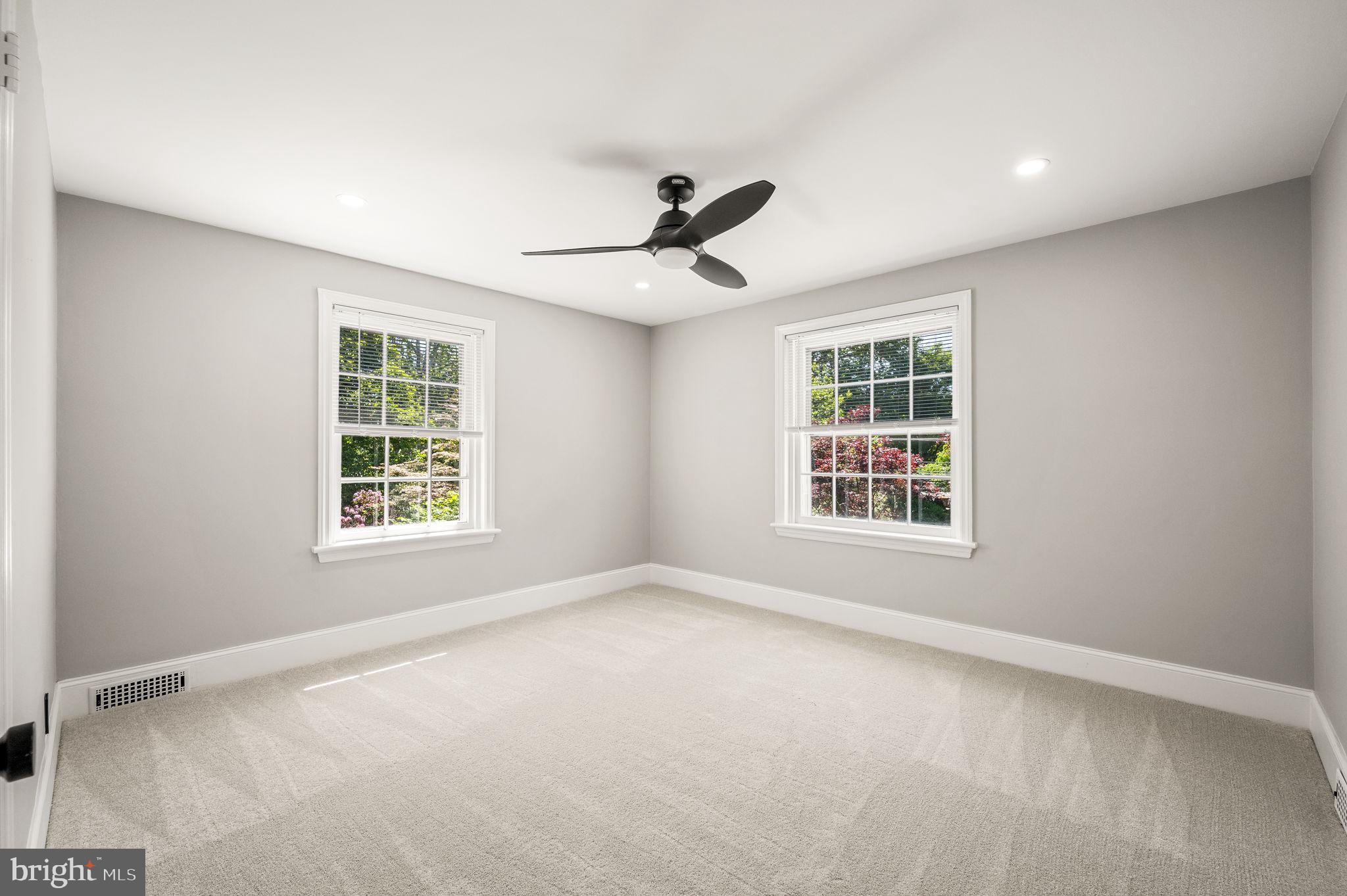 547 West Beechtree Lane Wayne, PA 19087 - Photo 27 of 51 an empty room with a window and a ceiling fan