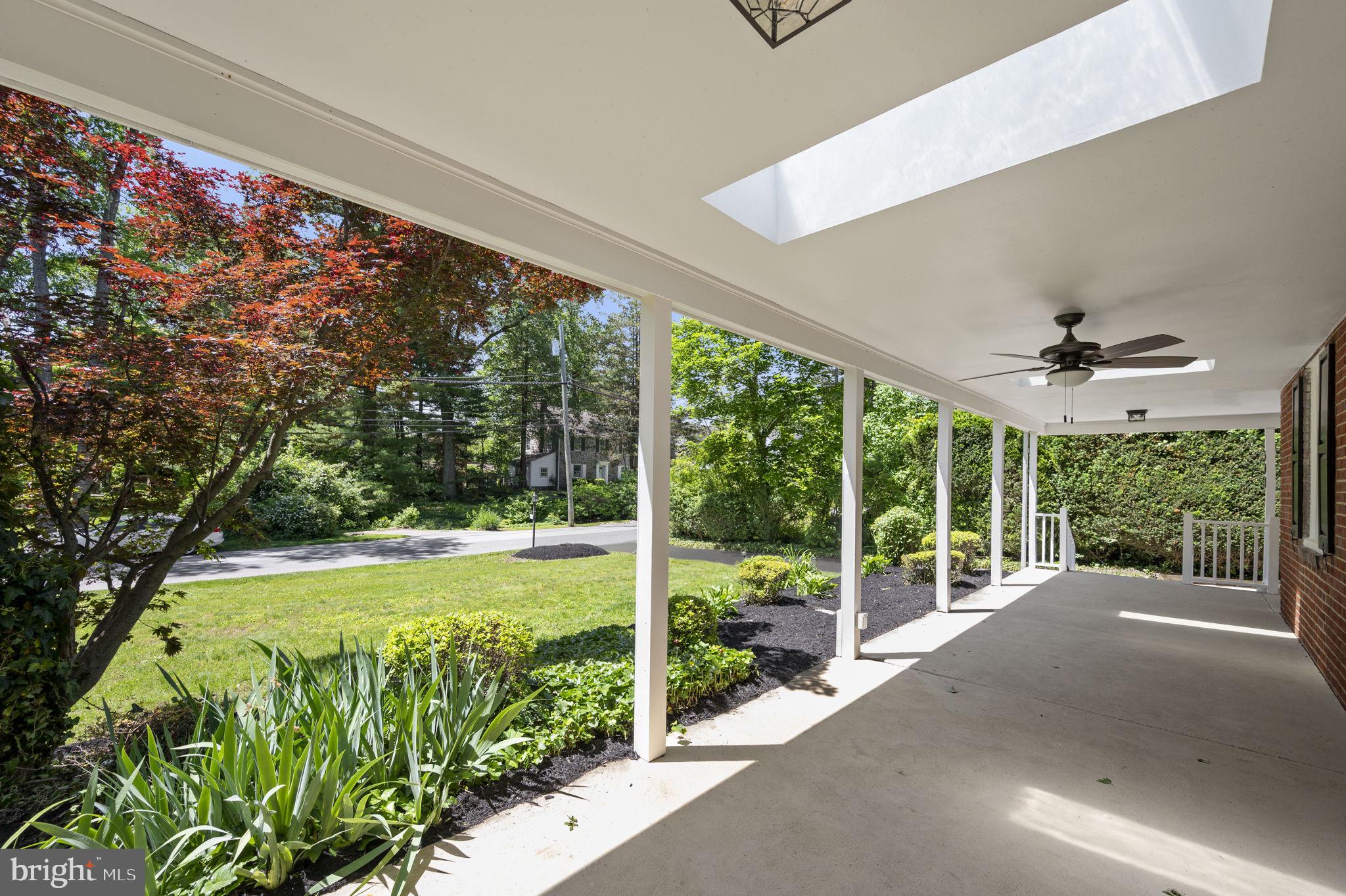 547 West Beechtree Lane Wayne, PA 19087 - Photo 4 of 51 a view of a porch with furniture and garden