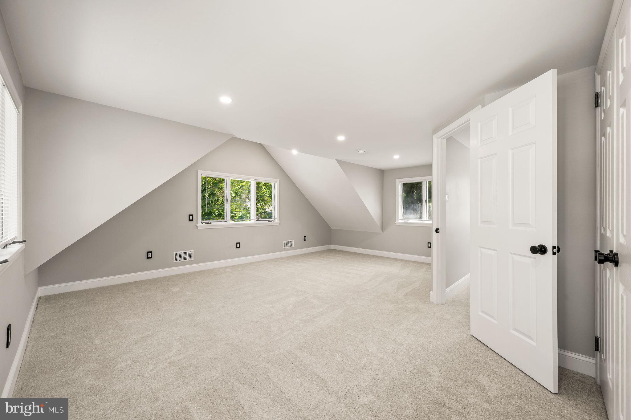 547 West Beechtree Lane Wayne, PA 19087 - Photo 48 of 51 an empty room with a window and fireplace